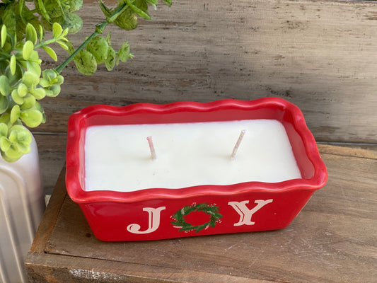 Joy cake pan candle